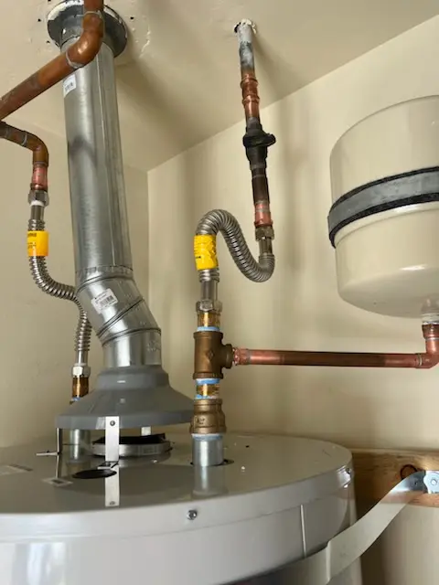 Water heater installation and plumbing repair in Trailridge